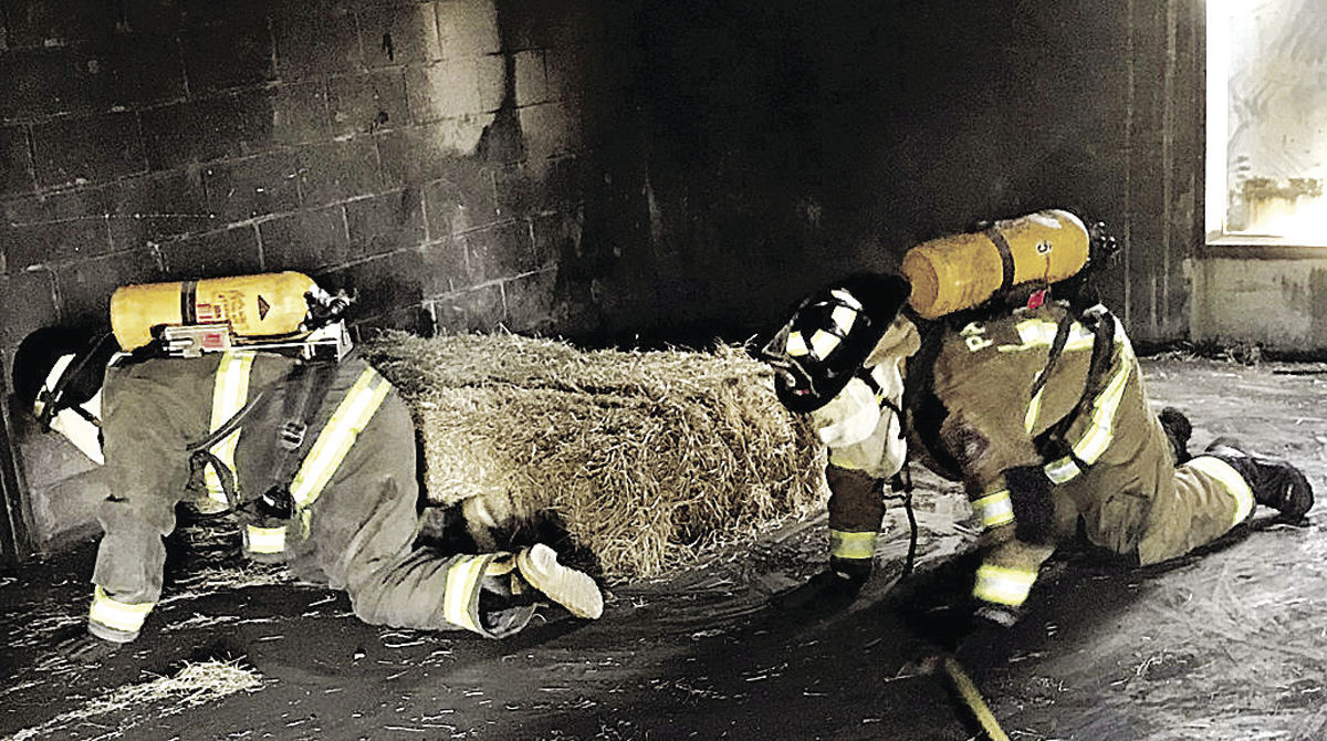 Firefighter students practice techniques